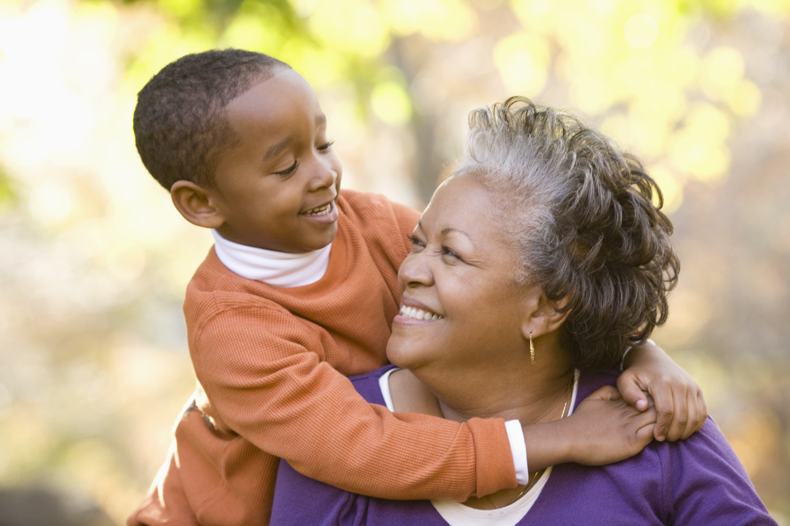 Woman & Grandson Smiling - Memory Care Home Solutions - Contact Us